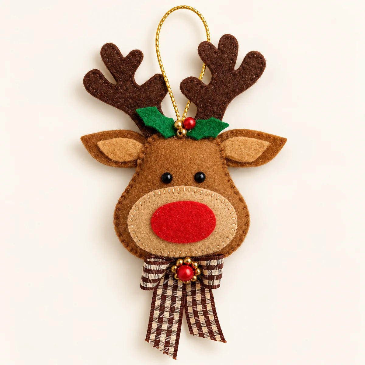 Hand-stitched felt reindeer with a checked ribbon